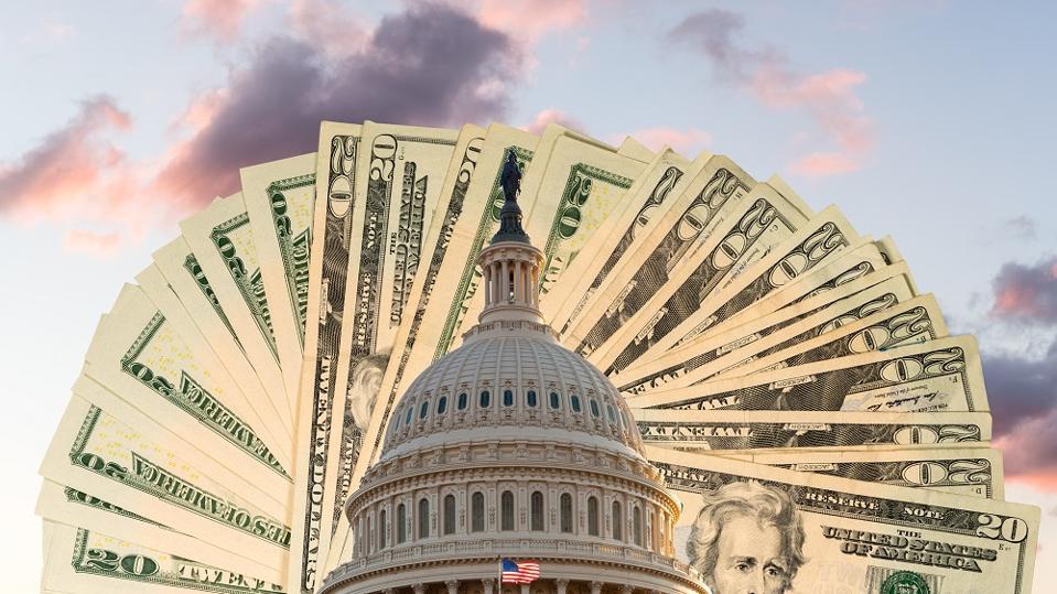 US Capitol in Washington DC with cash behind