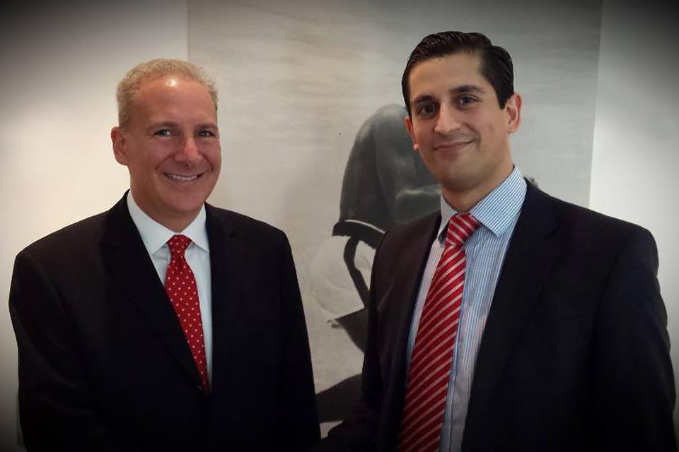 A picture of gold bug Peter Schiff and Alessio Rastani