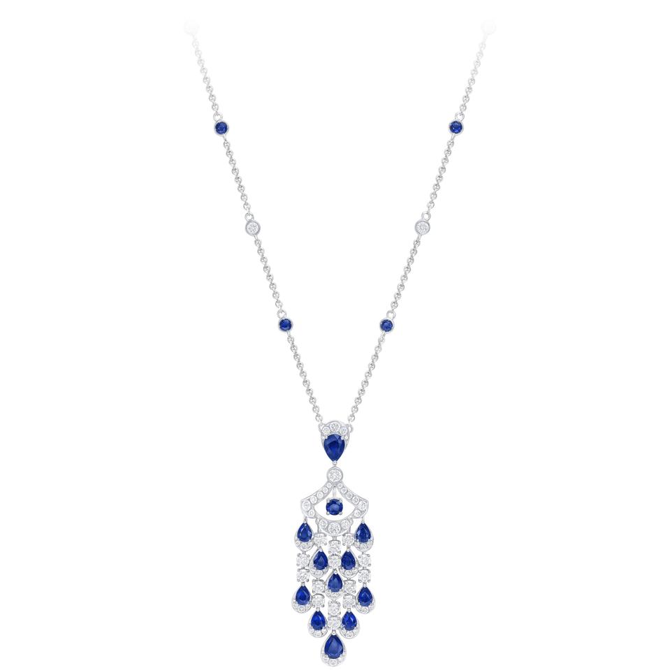 Pendant style diamond and sapphire necklace with chandelier style fringed flanked in sapphires