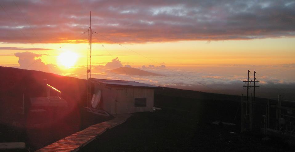Sunset west of Mauna Loa, seen from NOAA's Mauna Loa atmospheric baseline observatory, situated near the volcano's peak.