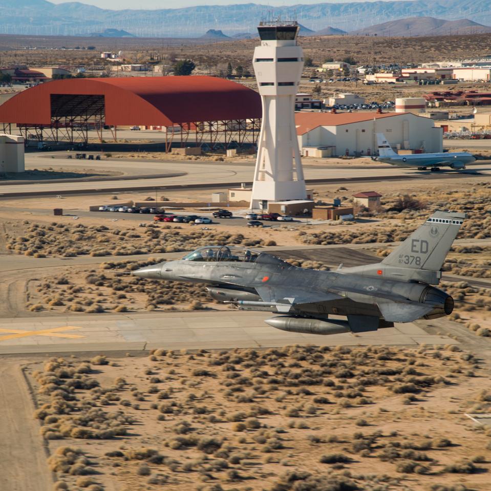 A 416th Flight Test Squadron F-16 low over Edwards AFB, NV.