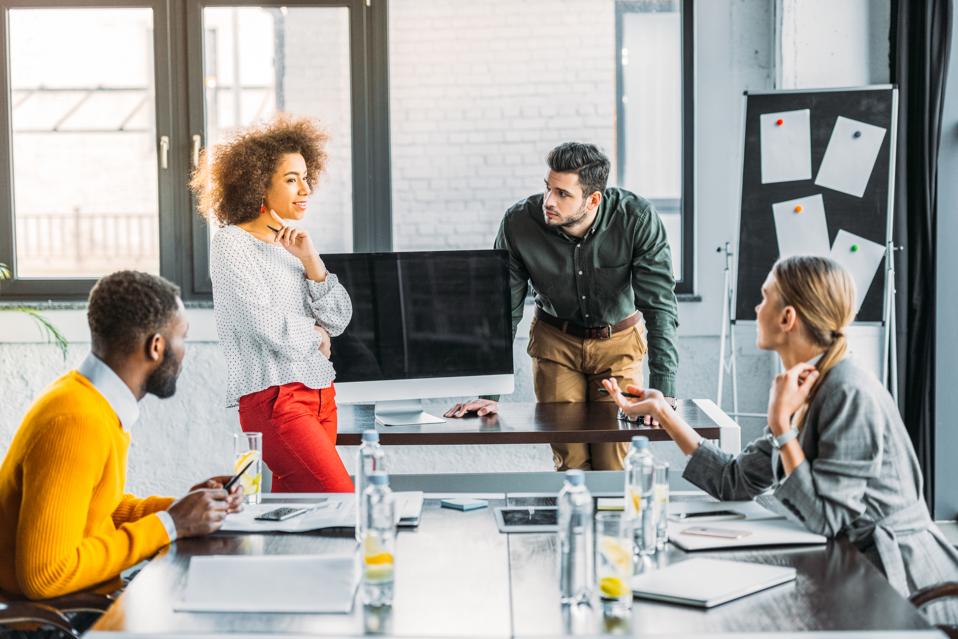 Young business partners having a meeting in an office