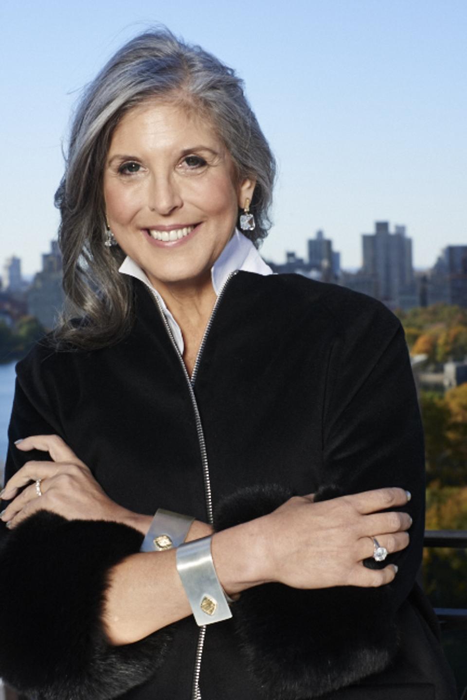 New York-based jewelry designer Joan Hornig wearing her French cuff bracelets.