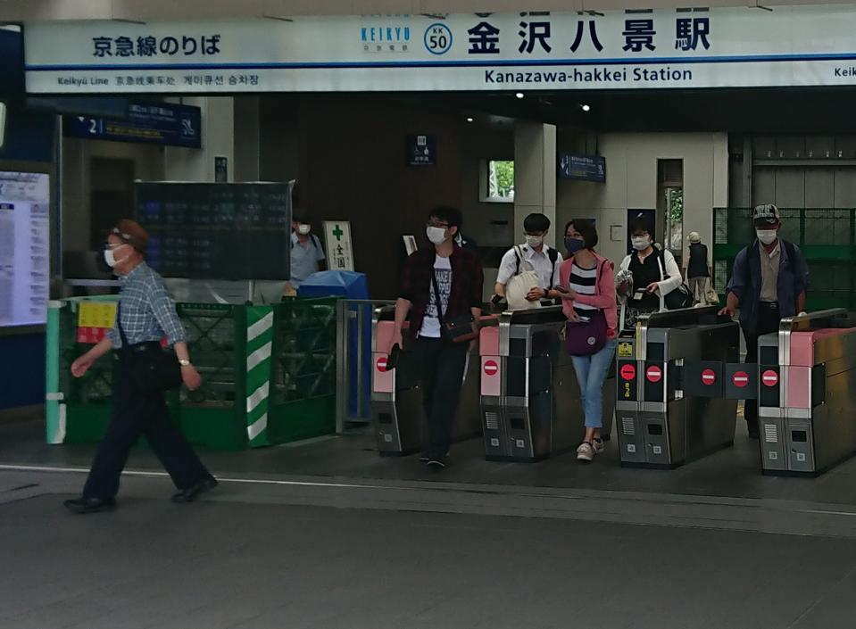 Mask Use Still Widespread In Slowly Reopening Japan As Coronavirus