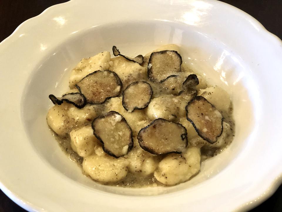 Daily house-made gnocchi with Australian black truffle butter at Mad Bene on Oahu.
