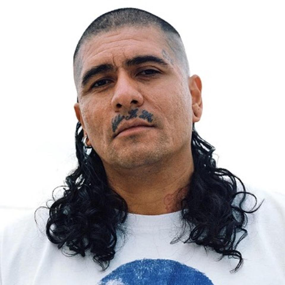 Rafa Esparza, a man with long hair - headshot