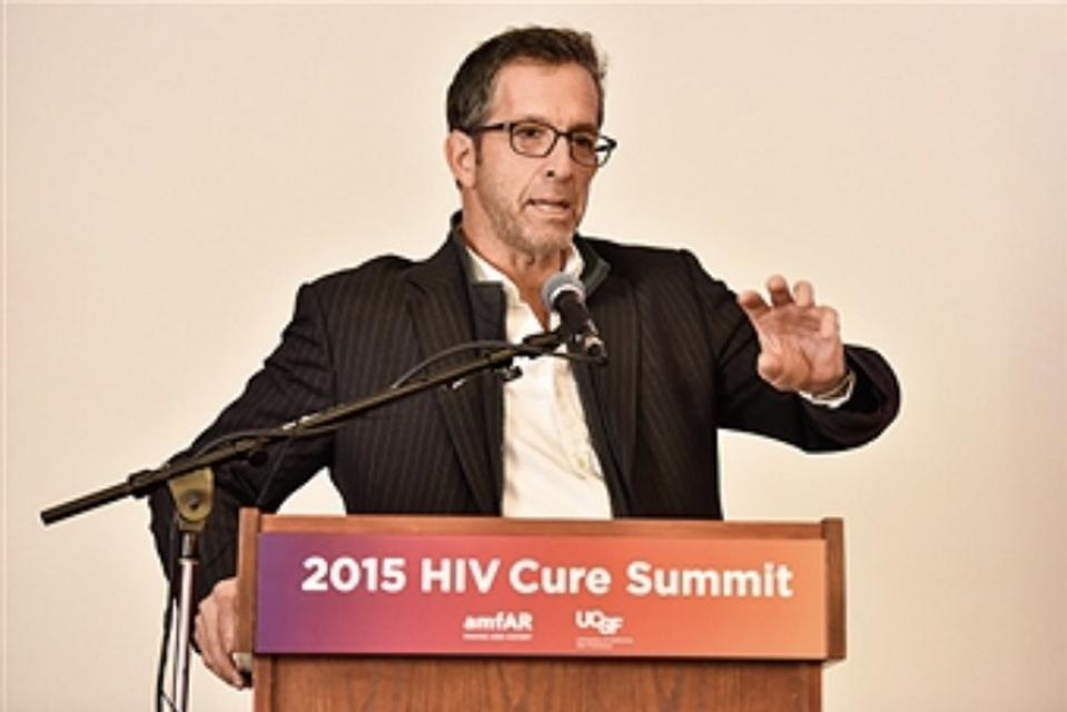 Kenneth Cole speaking at the 2015 HIV Cure Summit.