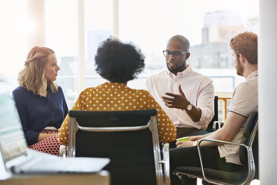 Business people having meeting in modern office