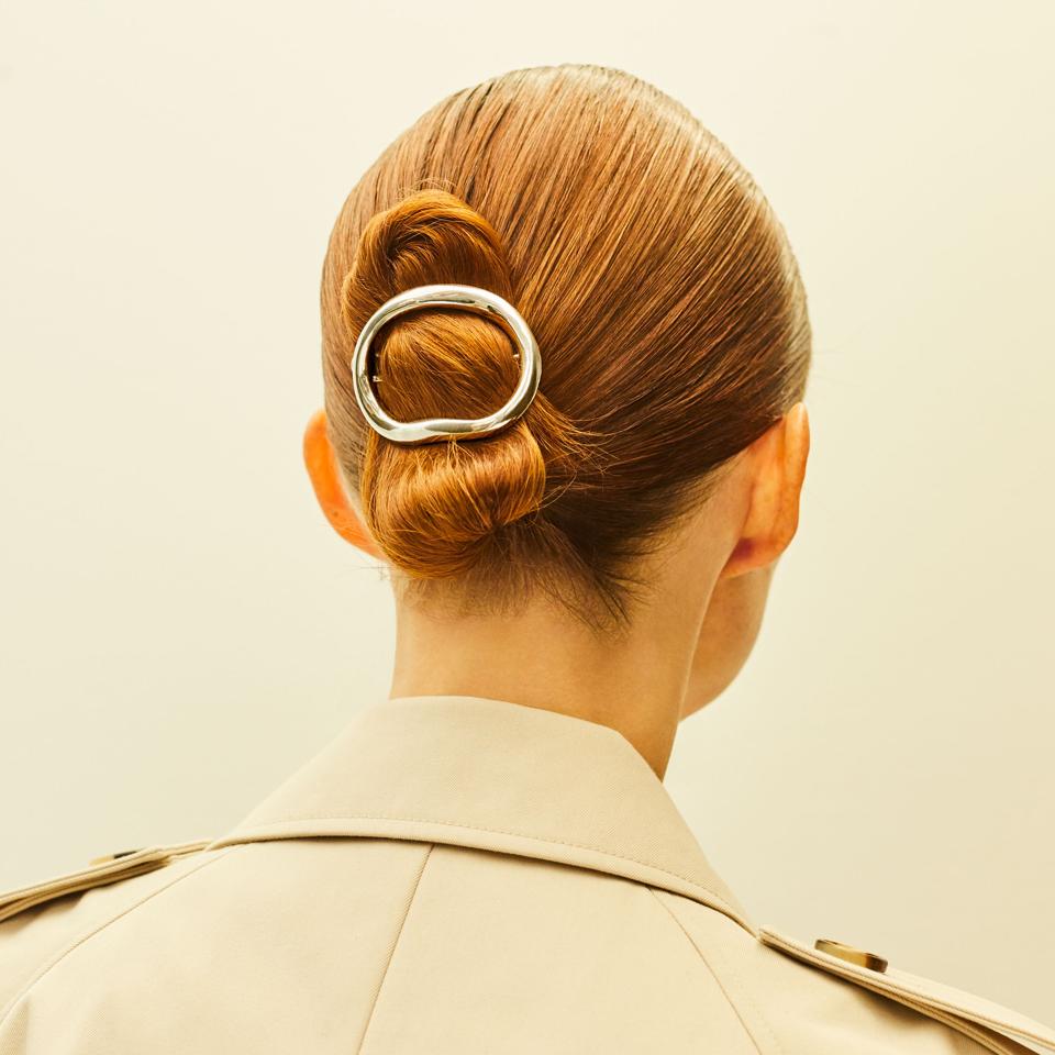 Made of sterling silver, handmade in NYC. Measures 2.5″ wide, 2″long.