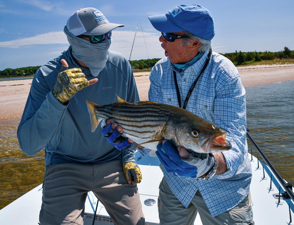 Premier FlyFishing Captain Paul Dixon Hauls The Billionaires To The
