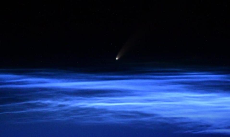 Comet NEOWISE as it appears from the cupola aboard the International Space Station.