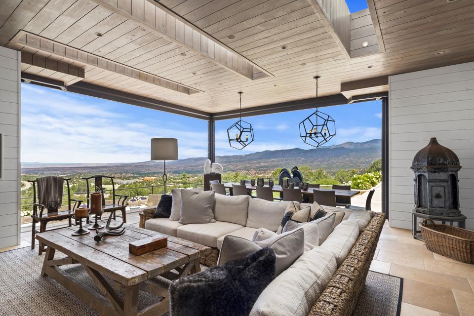 Living room with floor to ceiling windows