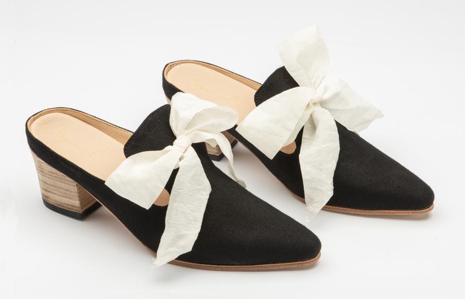 Black luxury canvas slip on mule with removable washed silk bow and smooth leather lining