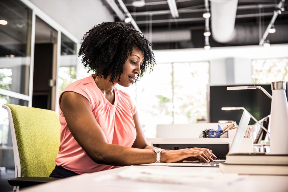 Woman working in modern business office