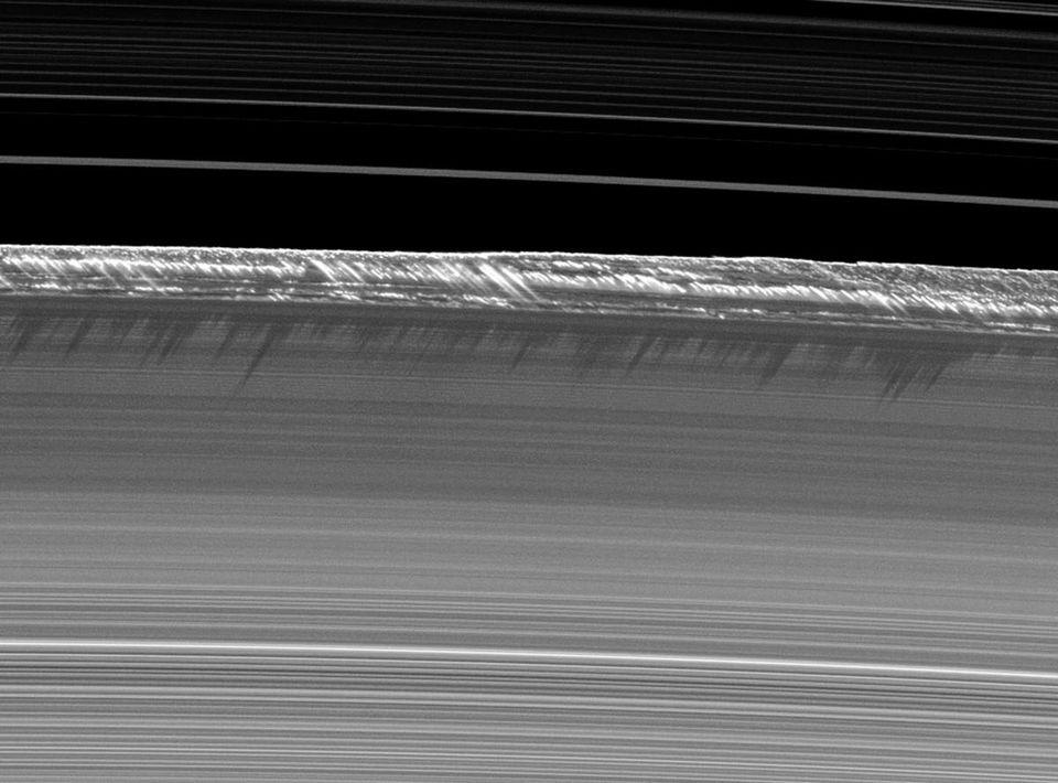 Saturn's rings in a nearly edge-on configuration, with the shadows cast by ice crystals.