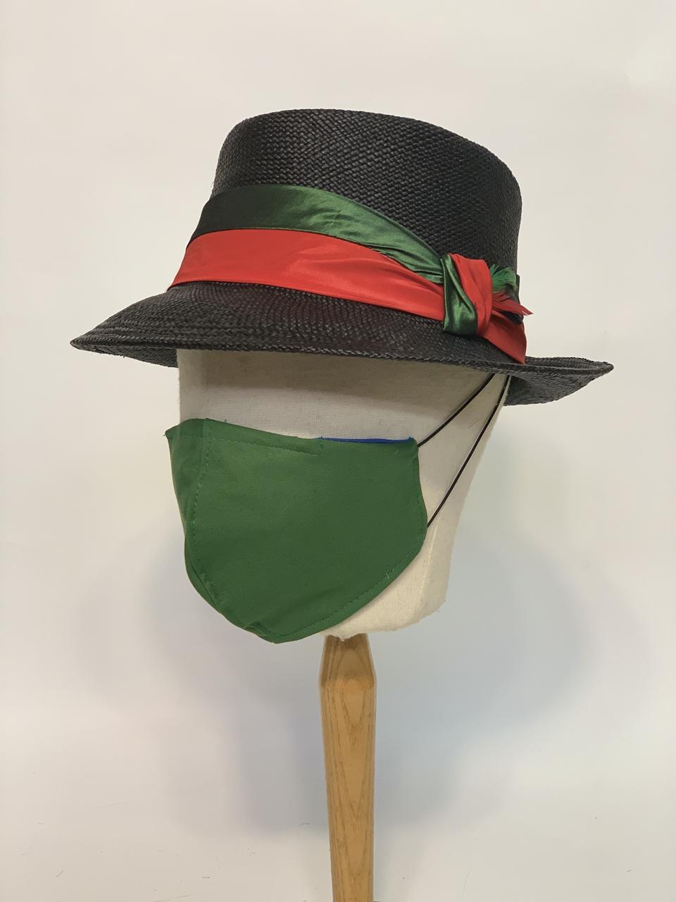 Hand blocked panama fedora trimmed with silk taffeta band and knot, paired with a cotton blend, forest green face mask