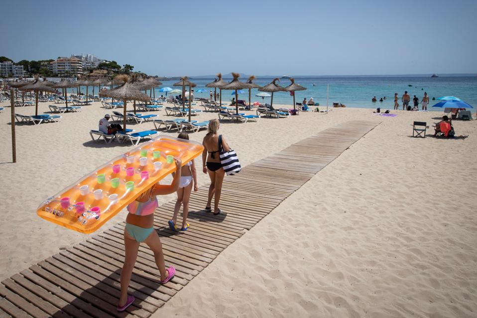 British Tourists file onto sunny Spanish beaches when quarantine rules ended