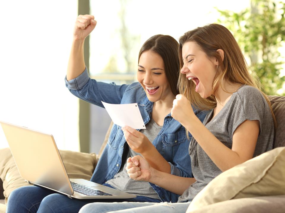 Ladies excited to receive a tax refund.