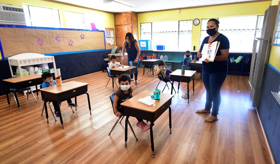 Pre-schoolers wearing masks in California