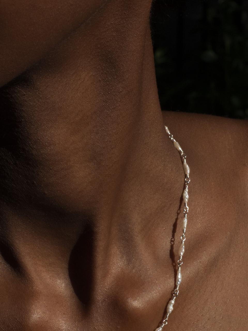 White freshwater seed pearls - 925 sterling silver findings some variation in pearl shape - each piece is unique made to order - choose your length at checkout