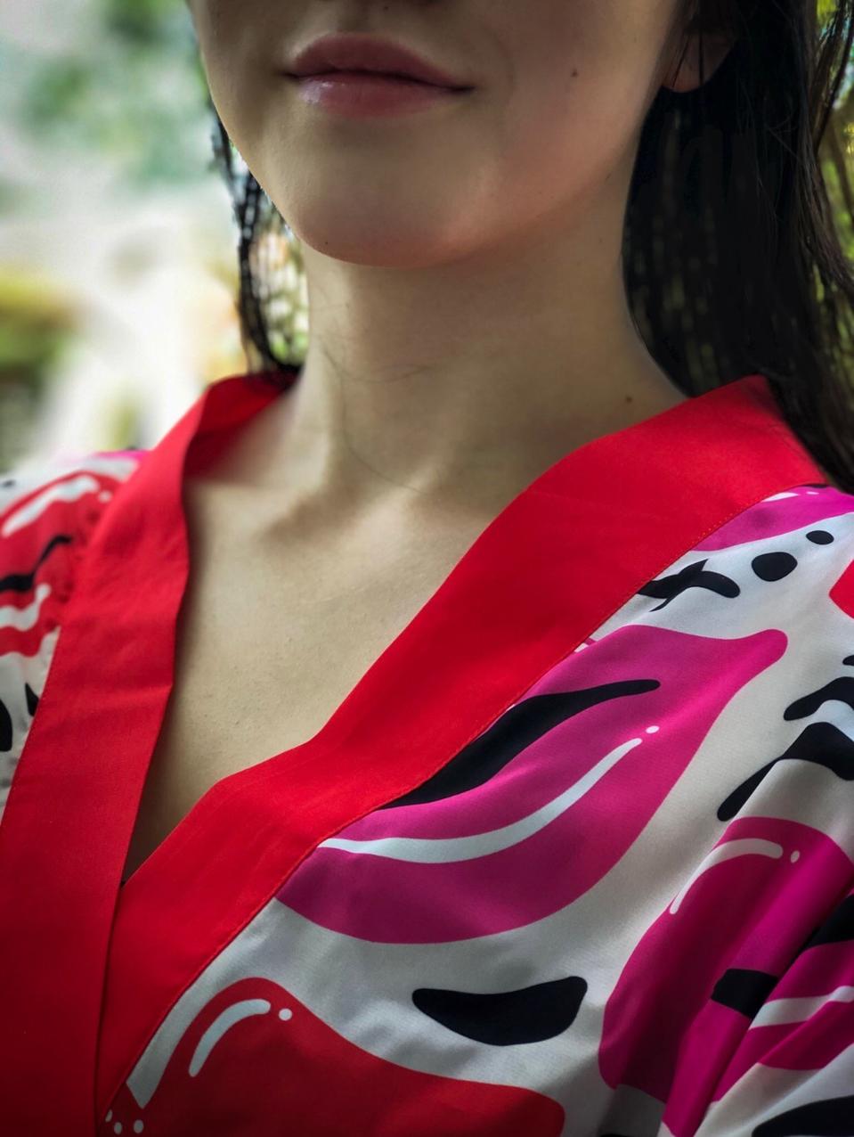 Woman wearing recycled PET bottle robe