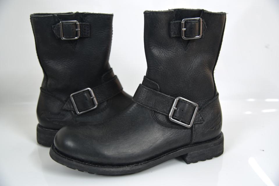 Biker-inspired boot, handcrafted with leather and a Goodyear welted rubber outsole. Available in dark brown or black.