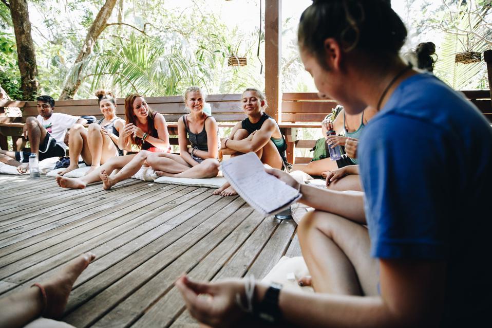 Gap Year students in a group on a deck.