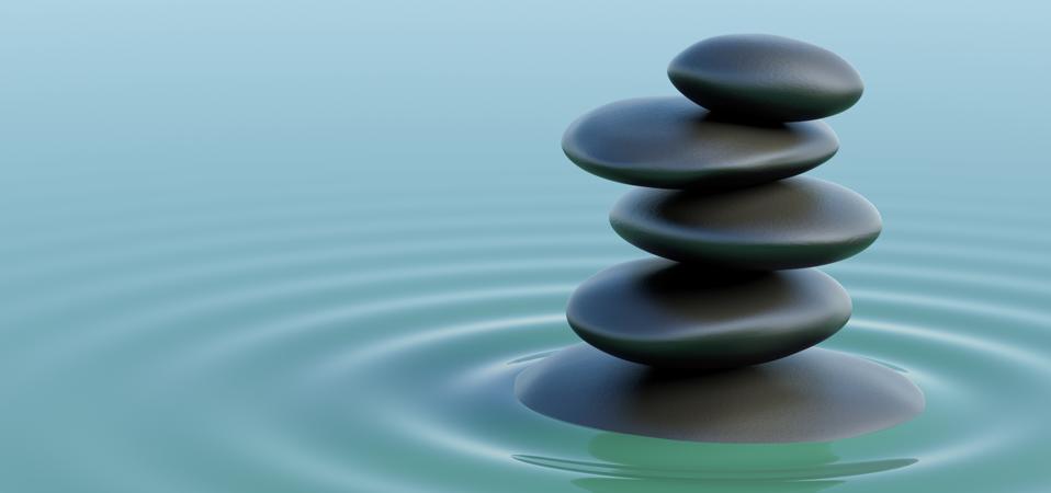 Stones balance in the turquoise water