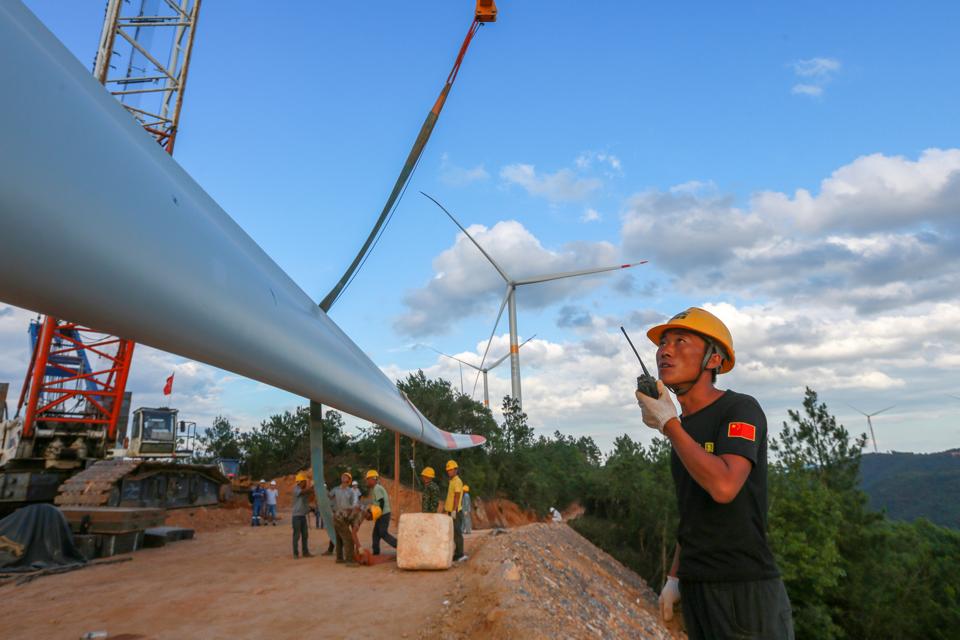 Wind Turbines Installation On Mountain In Ji'an