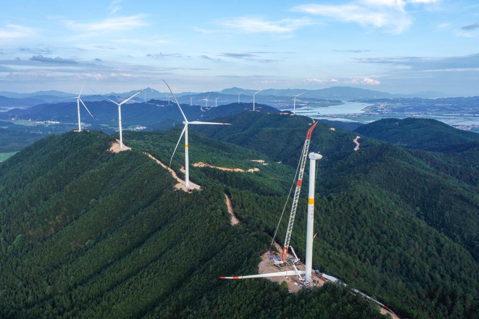 Wind Turbines Installation On Mountain In Ji'an