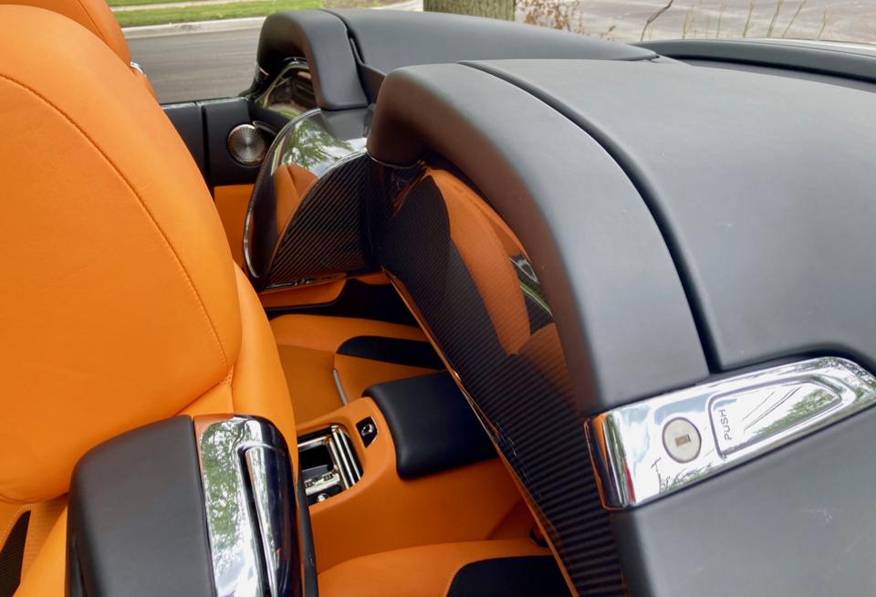 An optional Aero Cowling made from carbon fiber and aluminum covers the rear seat and essentially turns the four-place Dawn into a roadster.