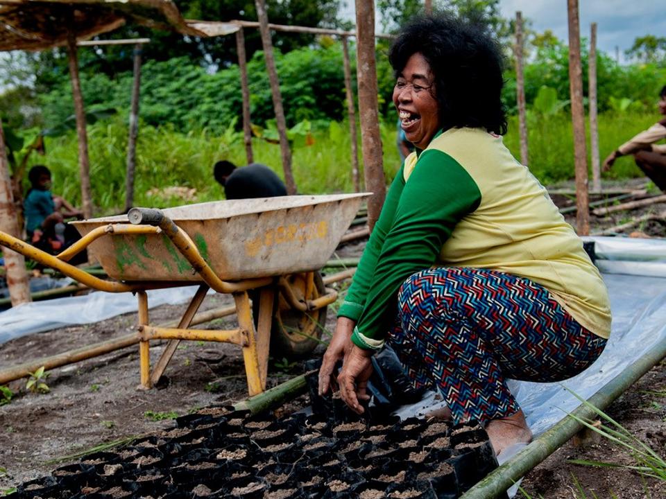 Woman working and laughing