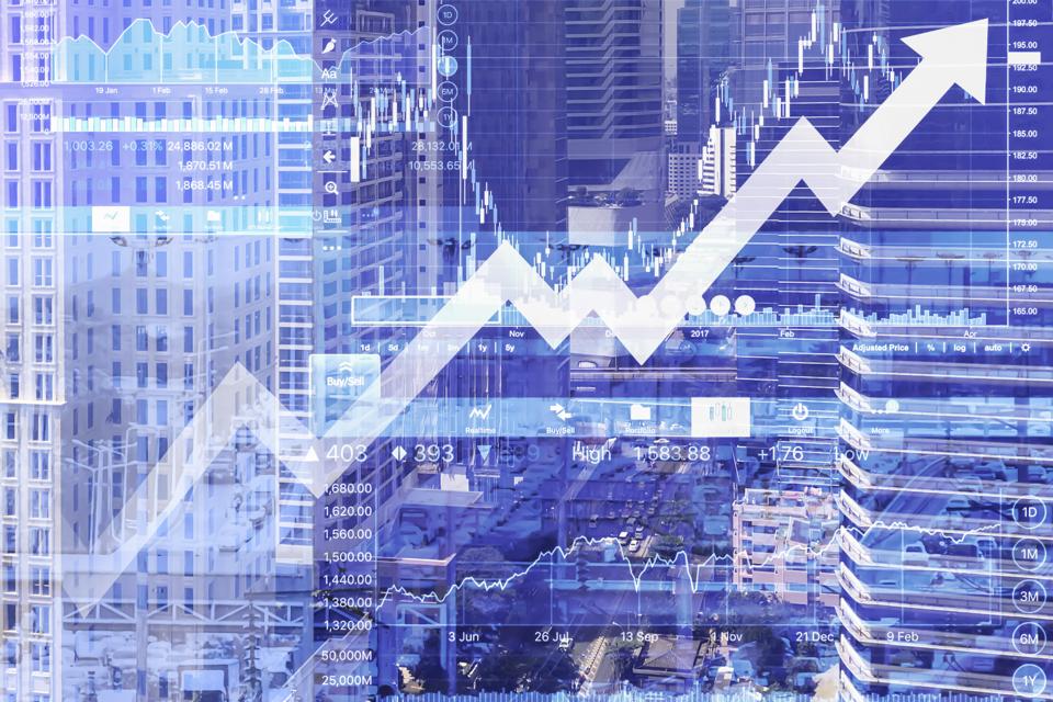 Multiple Exposure Of Graph And Modern Office Building In City