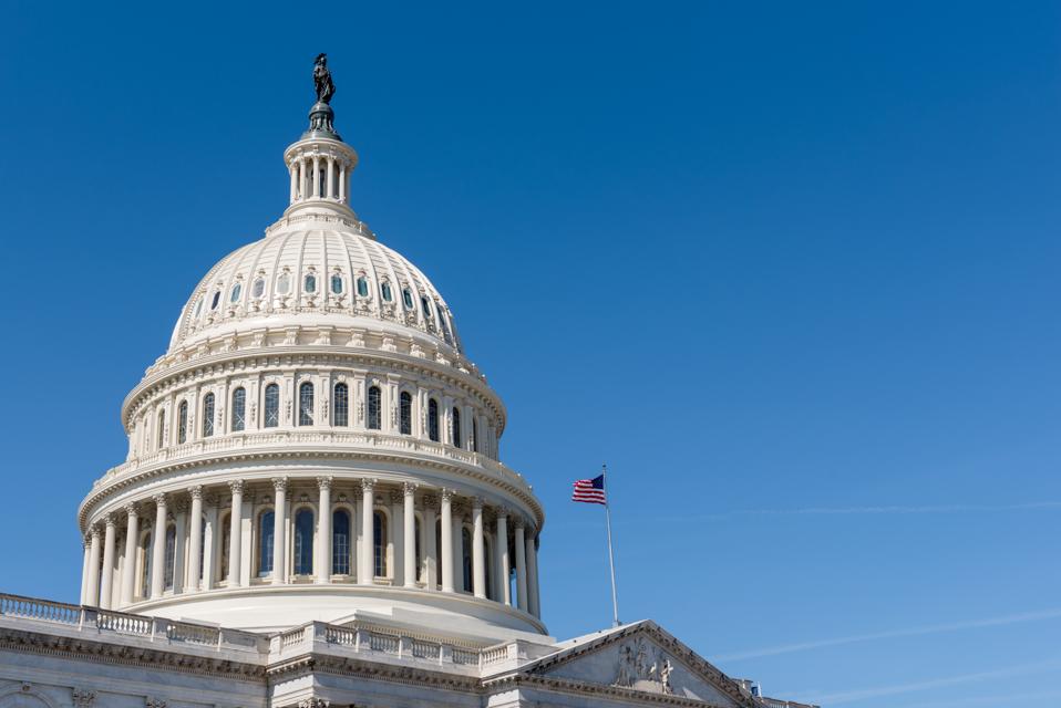US Capitol building dome with American flag