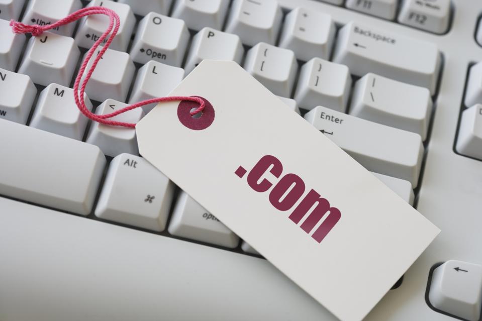 Computer keyboard with .com tag