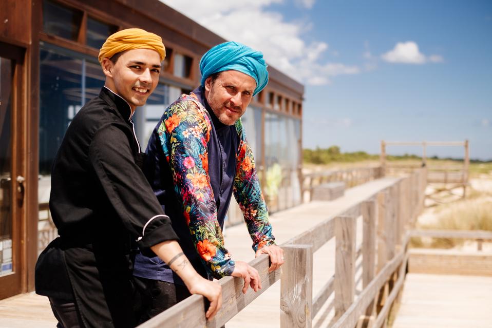 Chef Chakall and a colleague stand on the terrace of the Pr1me Beach Club in Portugal