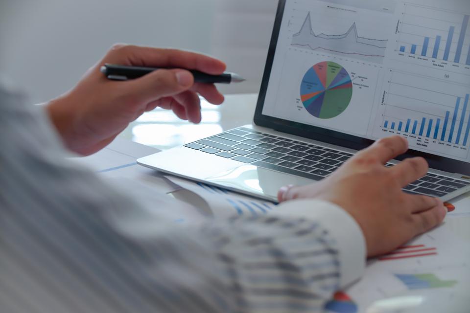 Close-Up Of Businessman Working In Office