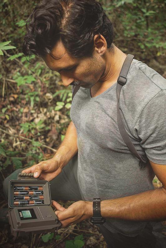 Juan de Dios Morales, founder of the Wild GYE Initiative , with a camera trap