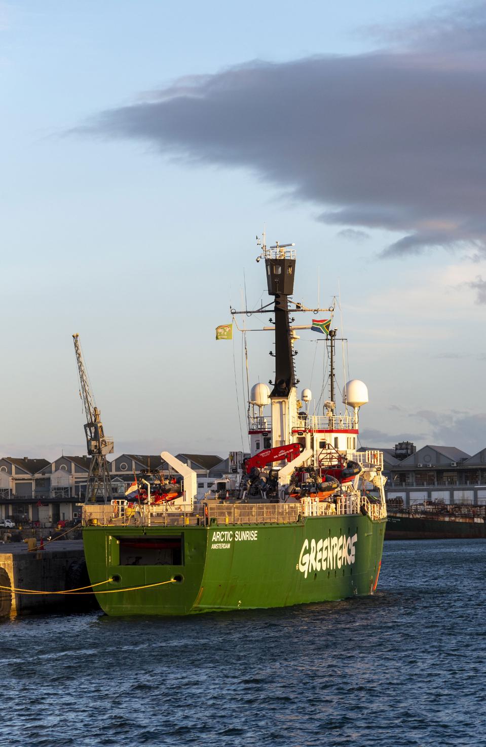 Cape Town South Africa, The Greenpeace vessel Artic Sunrise at sundown in Cape Town harbor. An ice breaker.