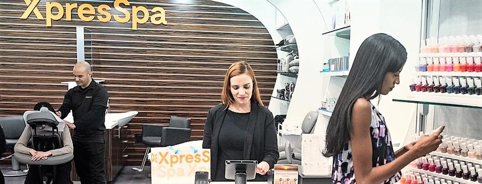 XpresSpa store showing massage and product selection