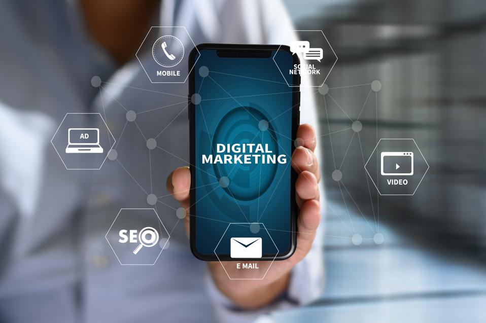 Digital Composite Image Of Man Using Mobile Phone With Icons