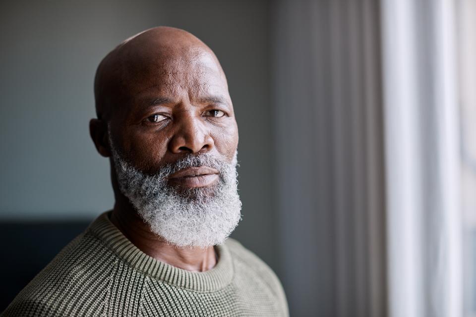 Older Black gentleman rocking a white beard.