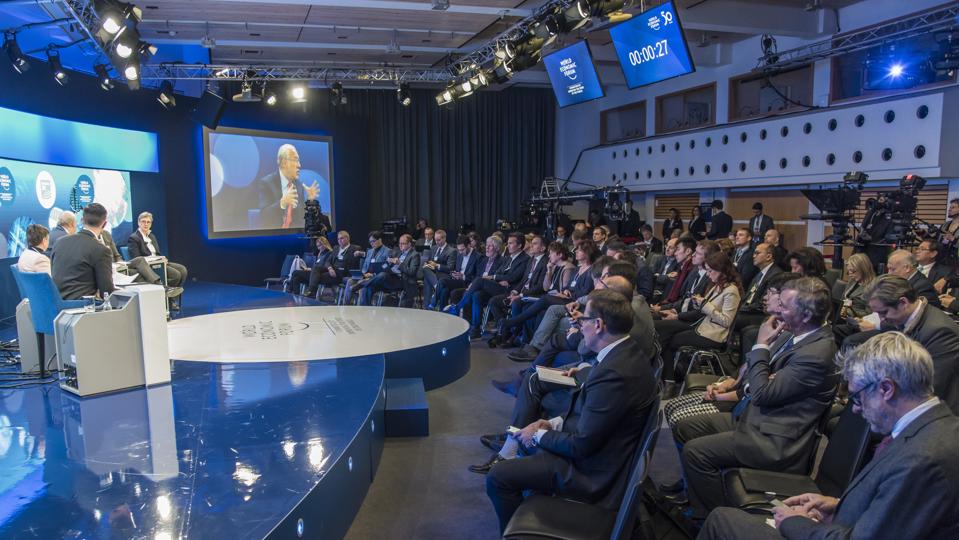 Participants attend a panel at the 50th World Economic Forum...