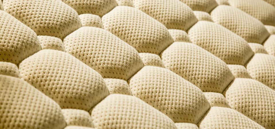 white color comfortable mattress closeup macro view pattern background