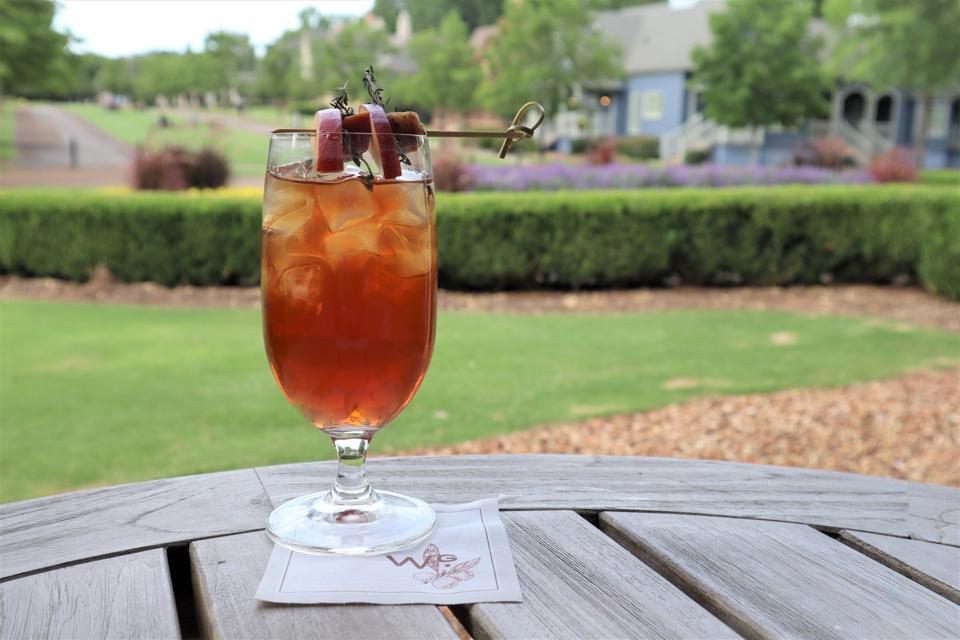 cocktail with thyme, nectarine, and pancetta