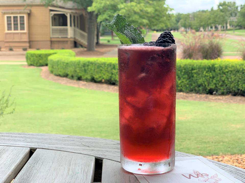 bourbon cocktail with blackberry