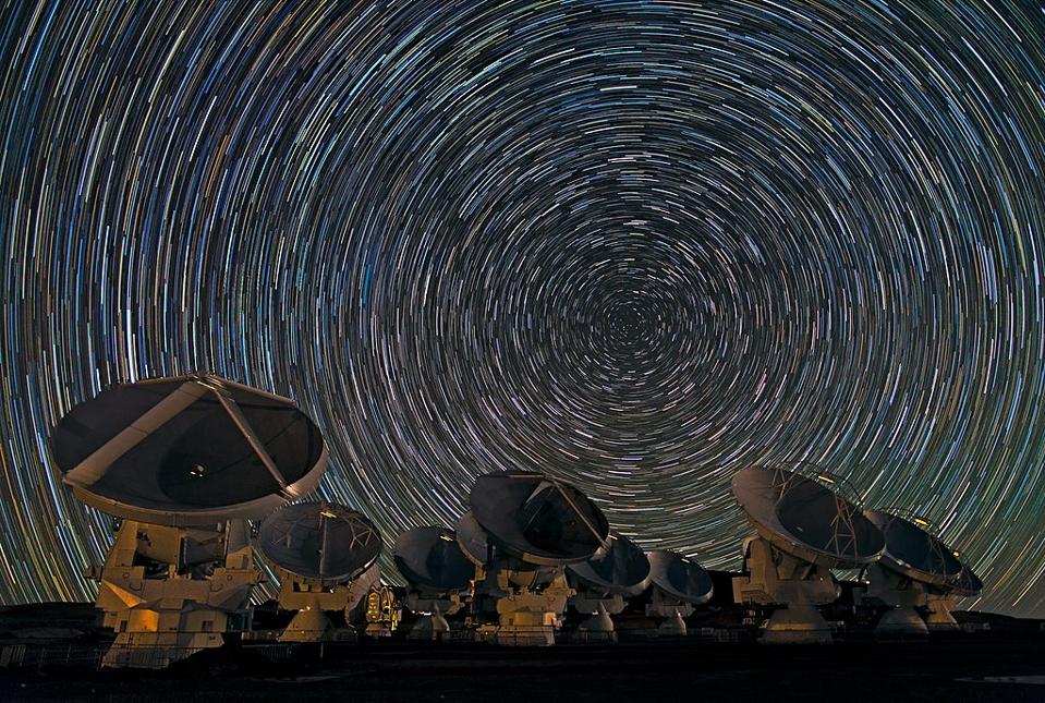 Star trails as photographed above the ALMA telescope array.