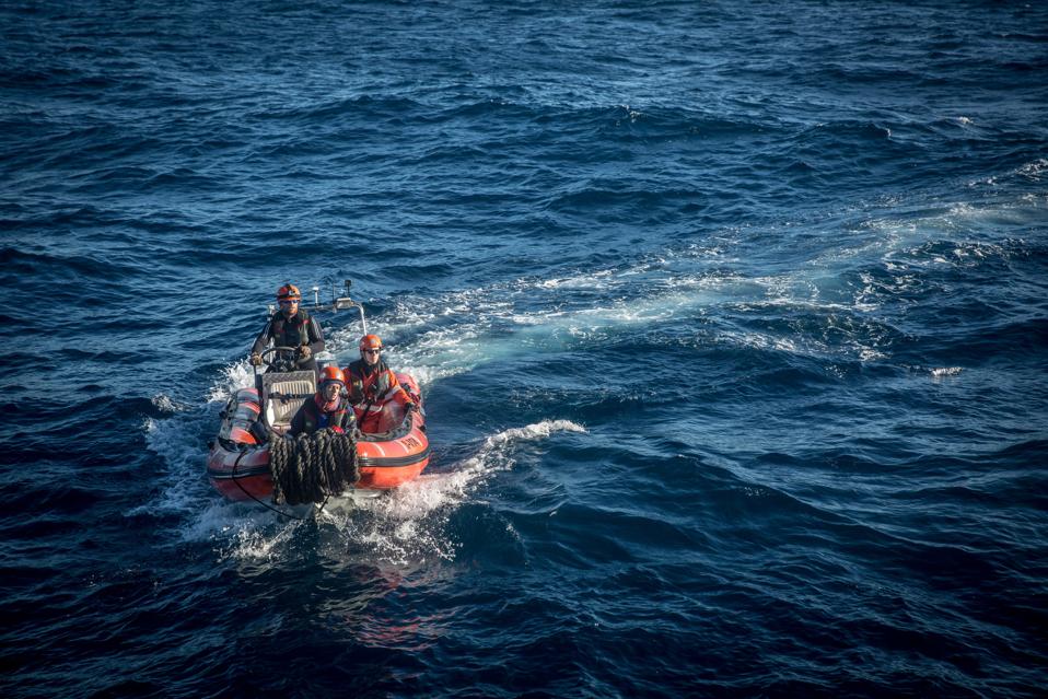 Crew of the Alan Kurdi rescue ship, operated by German...