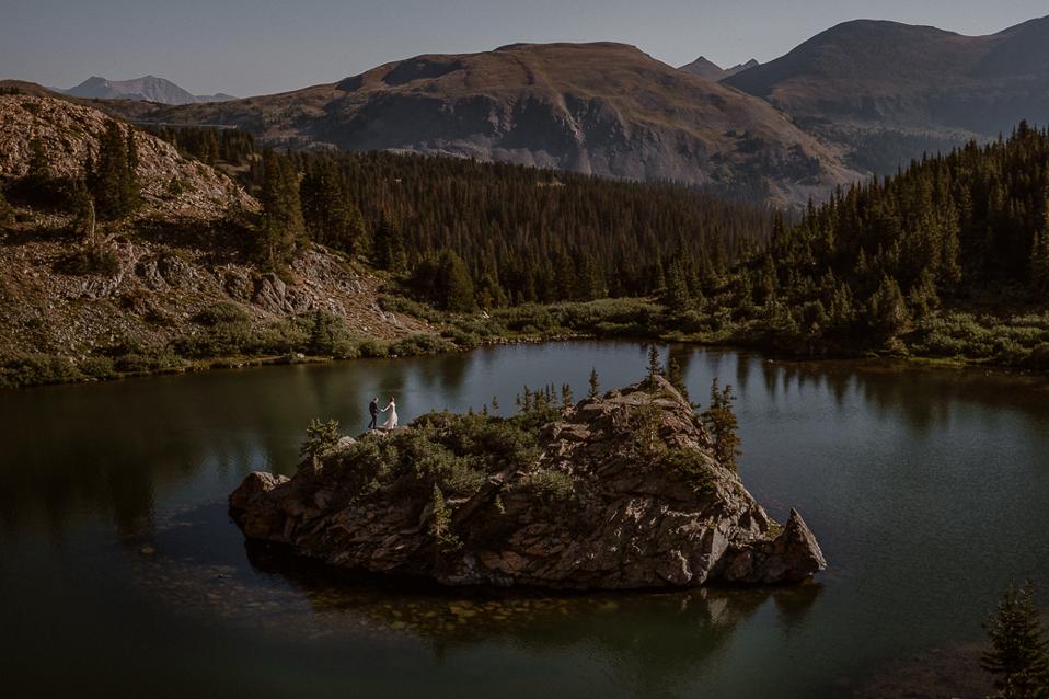 Mariah Jensen and Matt Taormina on a mountain lake island in Colorado.