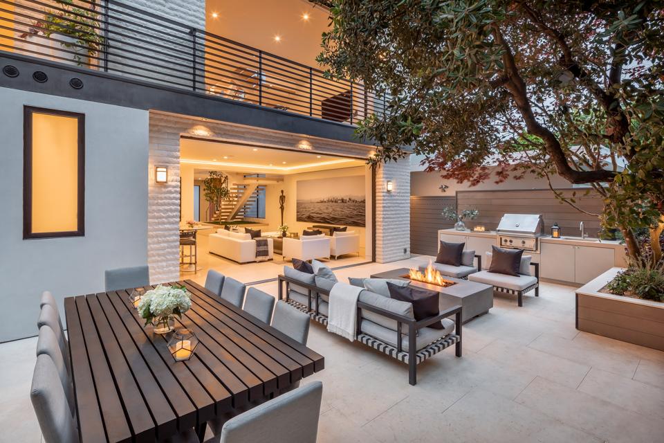 Backyard with outdoor kitchen, seating